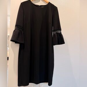 Elegant Black Dress with Bell Sleeves